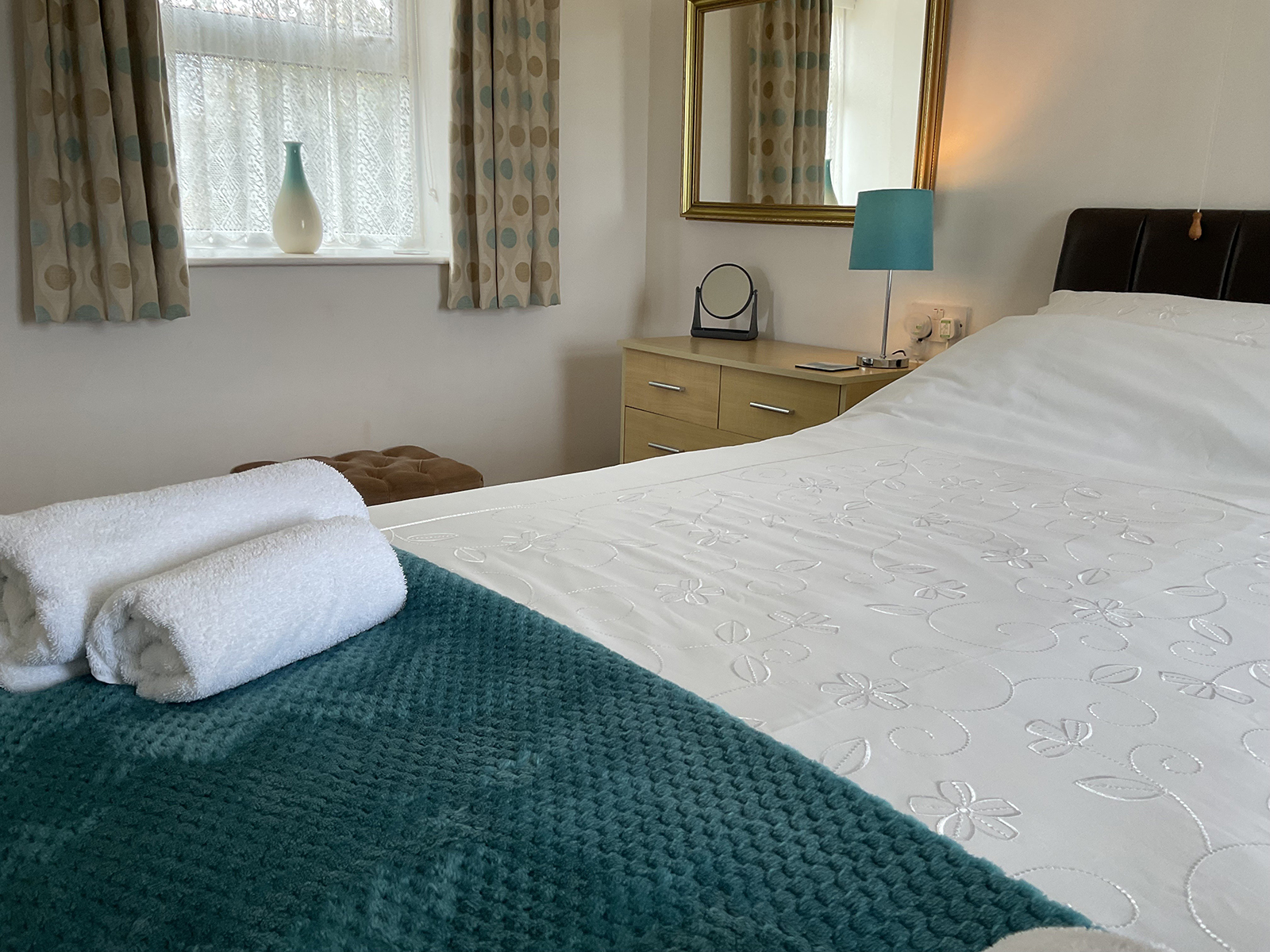 The Bedroom @ Trelawne Holiday Cottages sleeps 2 people.